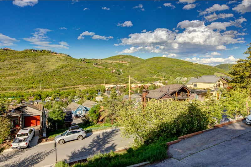 Wake up to expansive views of the valley and surrounding hills from your private deck.
