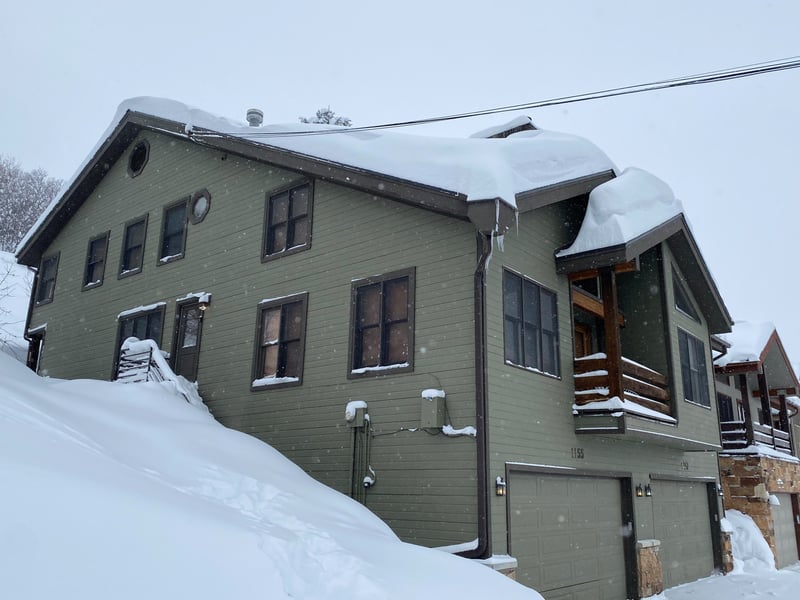 Convenient townhome entrance with private garage and ski-friendly access.
