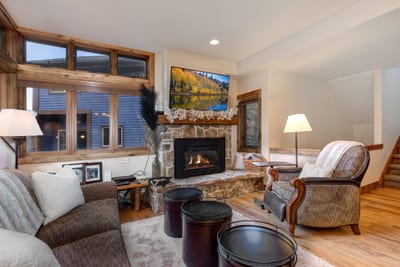 Spacious and bright, the living area invites cozy movie nights and relaxed conversations.