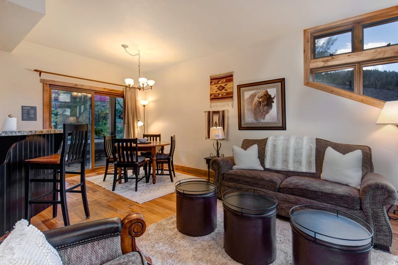 Natural light and plush seating make this living room a comfortable place to unwind.
