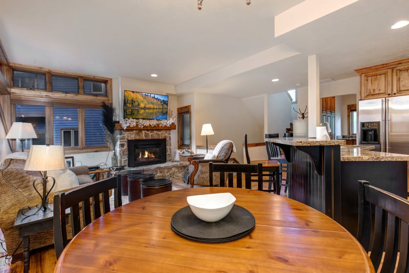 Share meals at the round dining table with seating for four