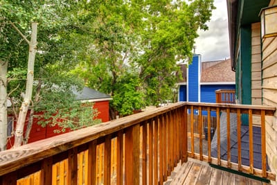 Step onto your private balcony and take in the trees, rooftops, and mountain air. PPS-1416