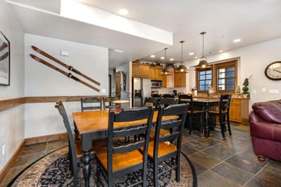 Share meals and stories at your dining table for eight, perfectly set between the kitchen and living room.