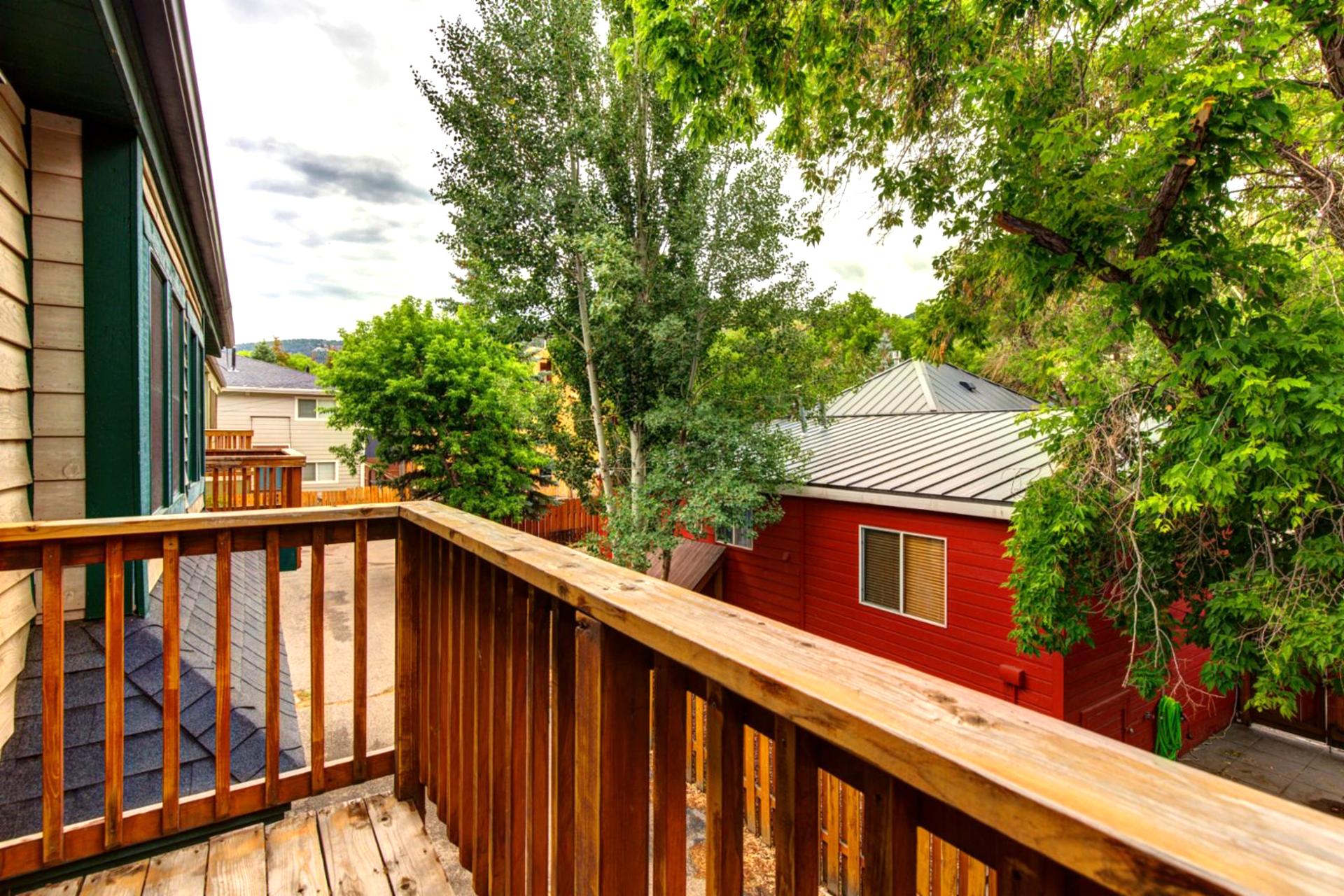 Step onto your private balcony and enjoy morning coffee with treetop views.
