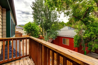 Step onto your private balcony and enjoy morning coffee with treetop views.