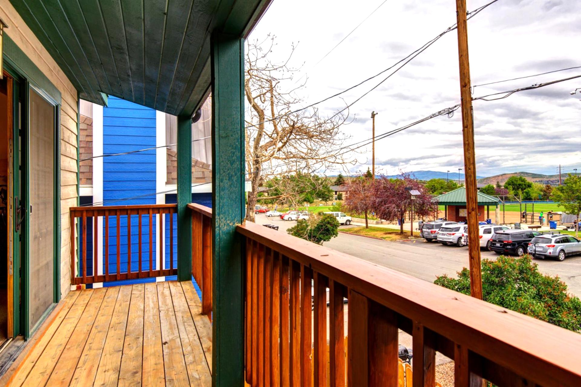 A third balcony provides views of the surrounding neighborhood and a spot to enjoy fresh air.
