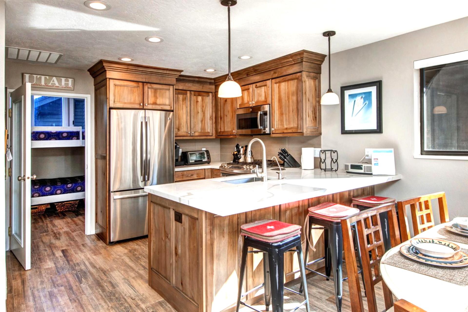 Bar seating for three makes it easy to fuel up before hitting the slopes.