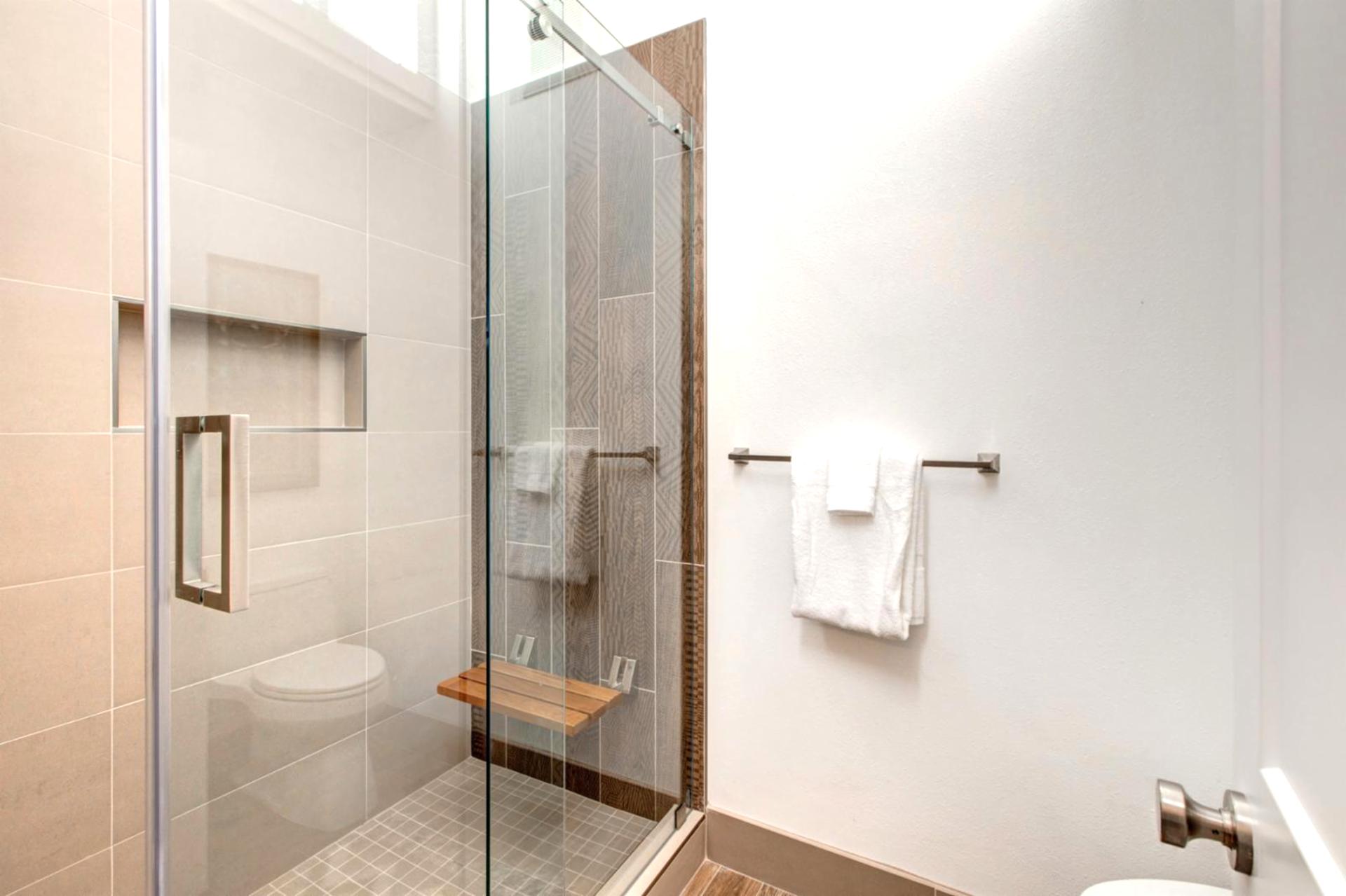 Walk-in tiled shower offers a refreshing rinse after a day on the mountain.