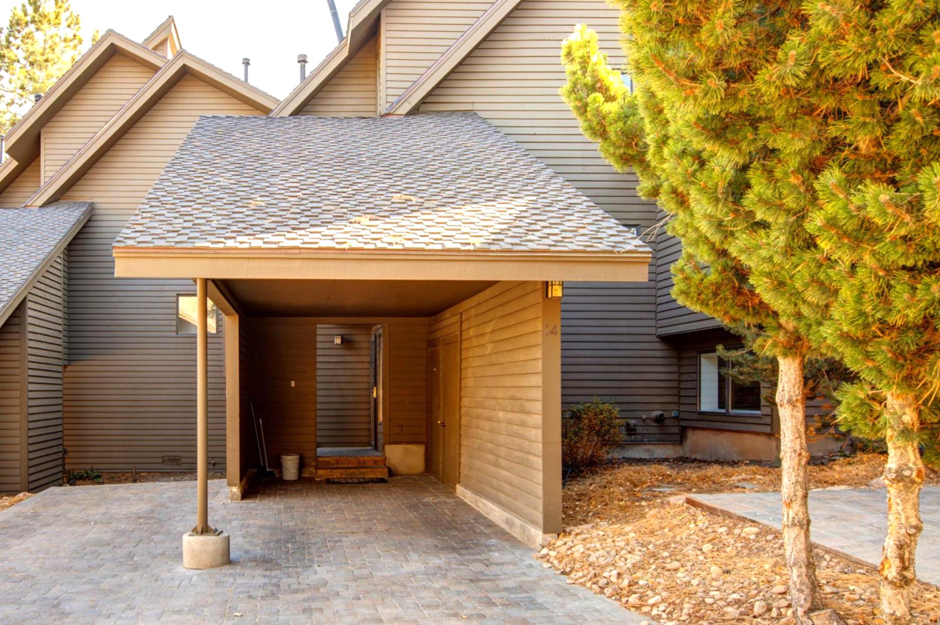 Covered carport parking keeps your vehicle snow-free and ready for mountain adventures.

