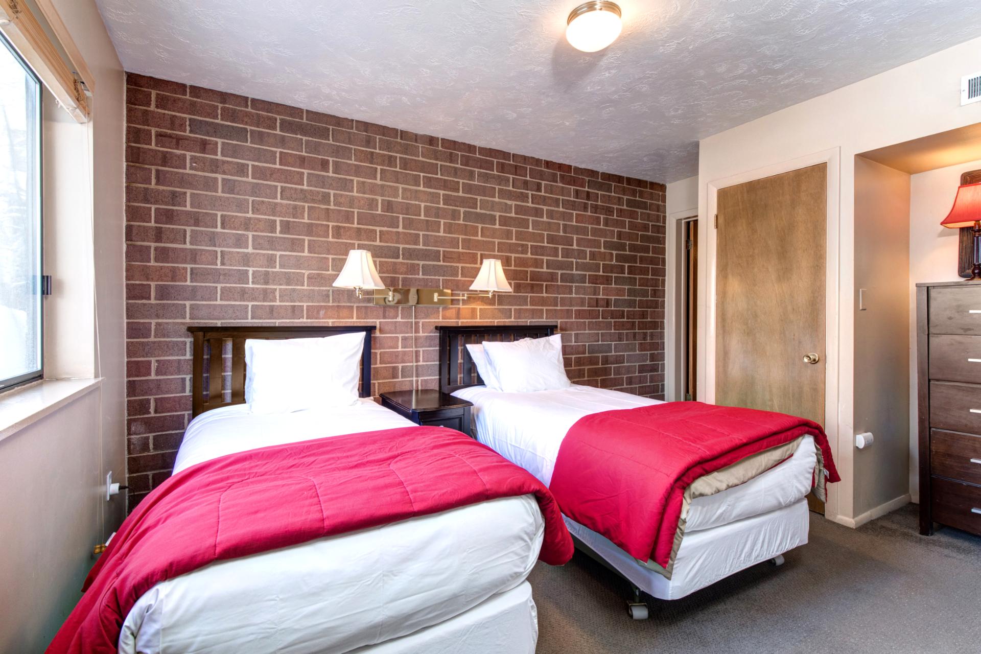 Guest Bedroom 2 features a King bed, closet space, and ensuite access.