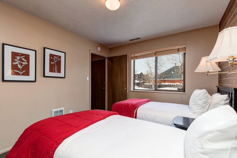 Alternate view of twin bedroom with ensuite bathroom