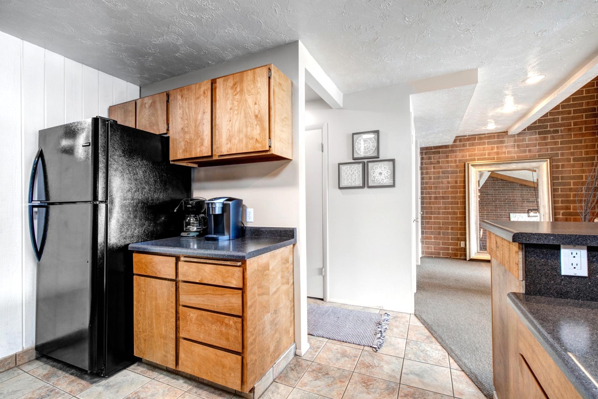 Cozy and compact kitchen layout with everything you need for home-cooked meals.