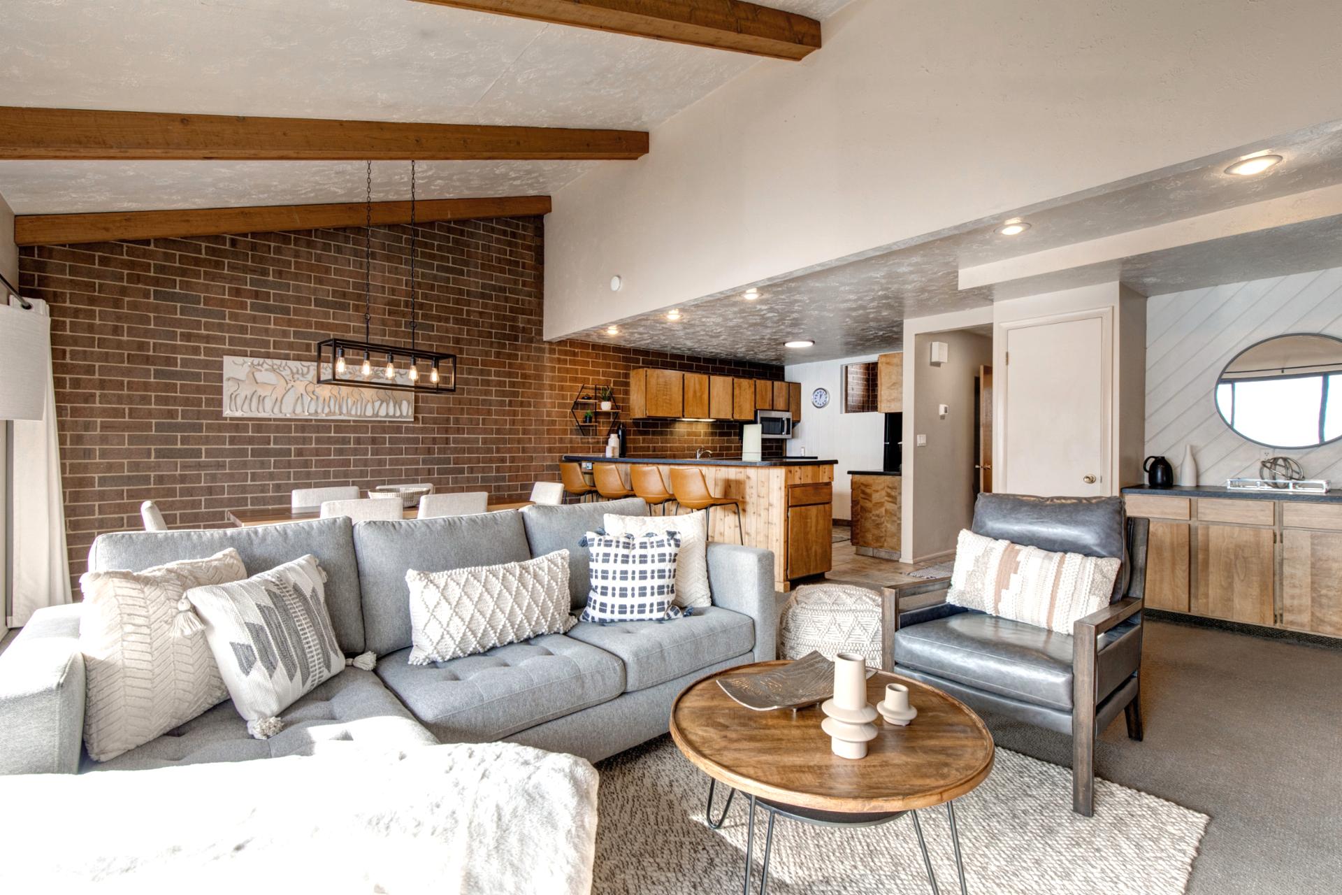 Open layout connects living, dining, and kitchen. Ideal for relaxing or entertaining.