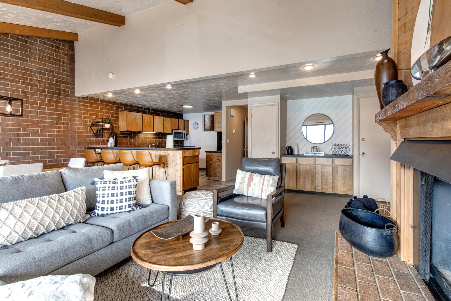 Comfortable sectional seating and natural light make this living area perfect for group hangs.