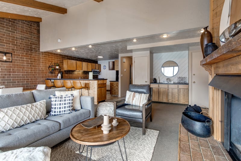 Comfortable sectional seating and natural light make this living area perfect for group hangs.