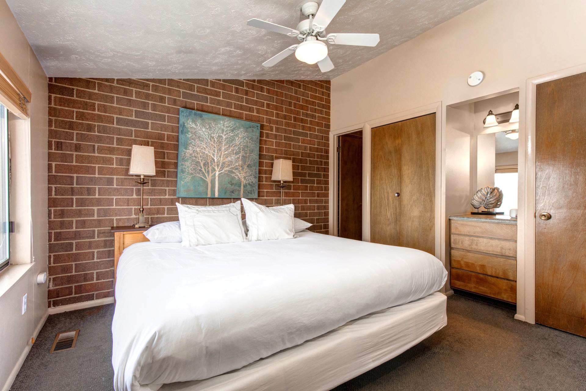 Guest room with two Twin beds, perfect for kids or singles, with mountain lodge charm.