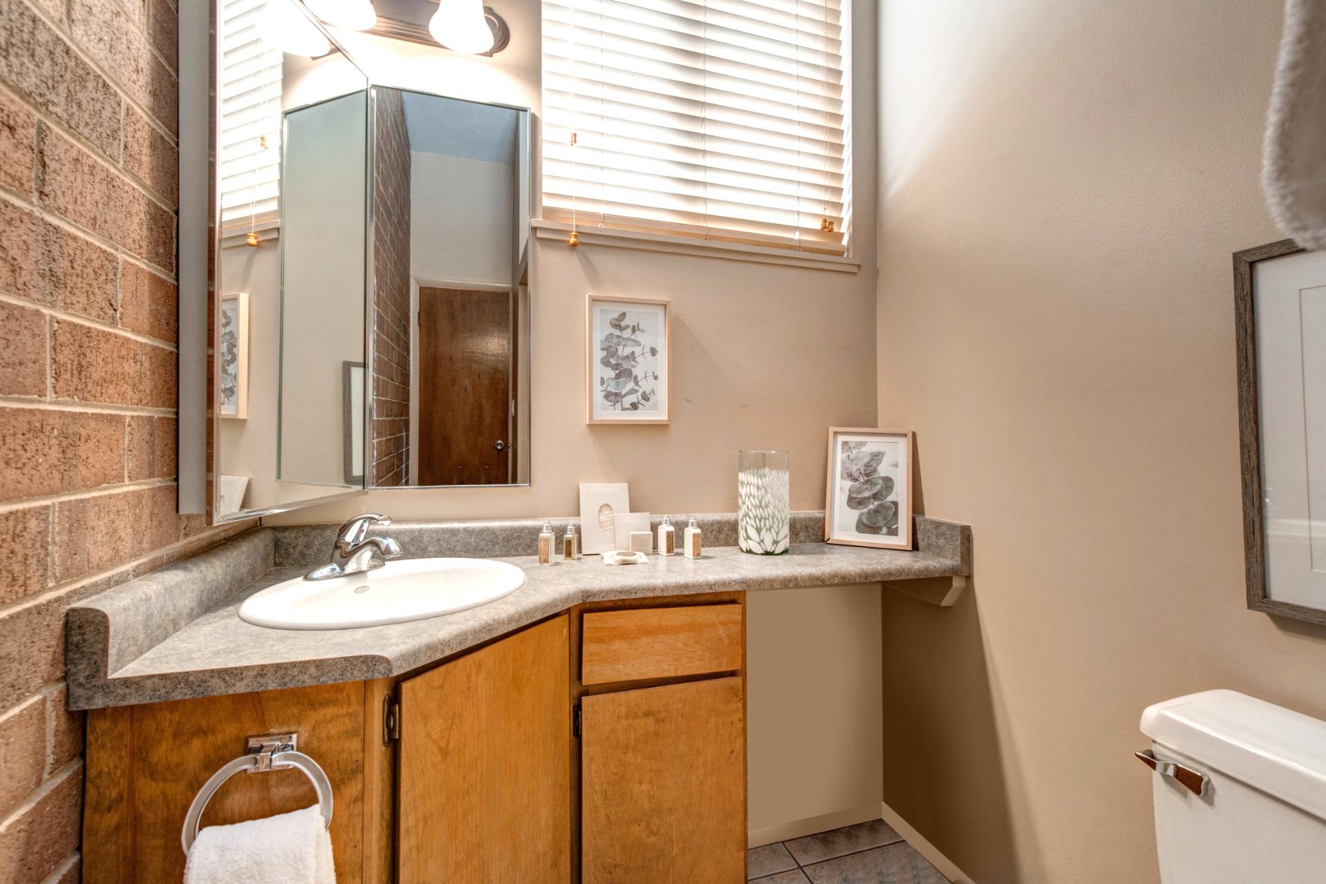 Modern fixtures and clean tile complete this second King suite’s private bath.