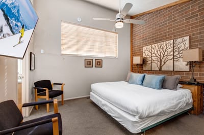 Sleep soundly in your main suite with King bed, vaulted ceiling, and direct access to the ensuite bath.