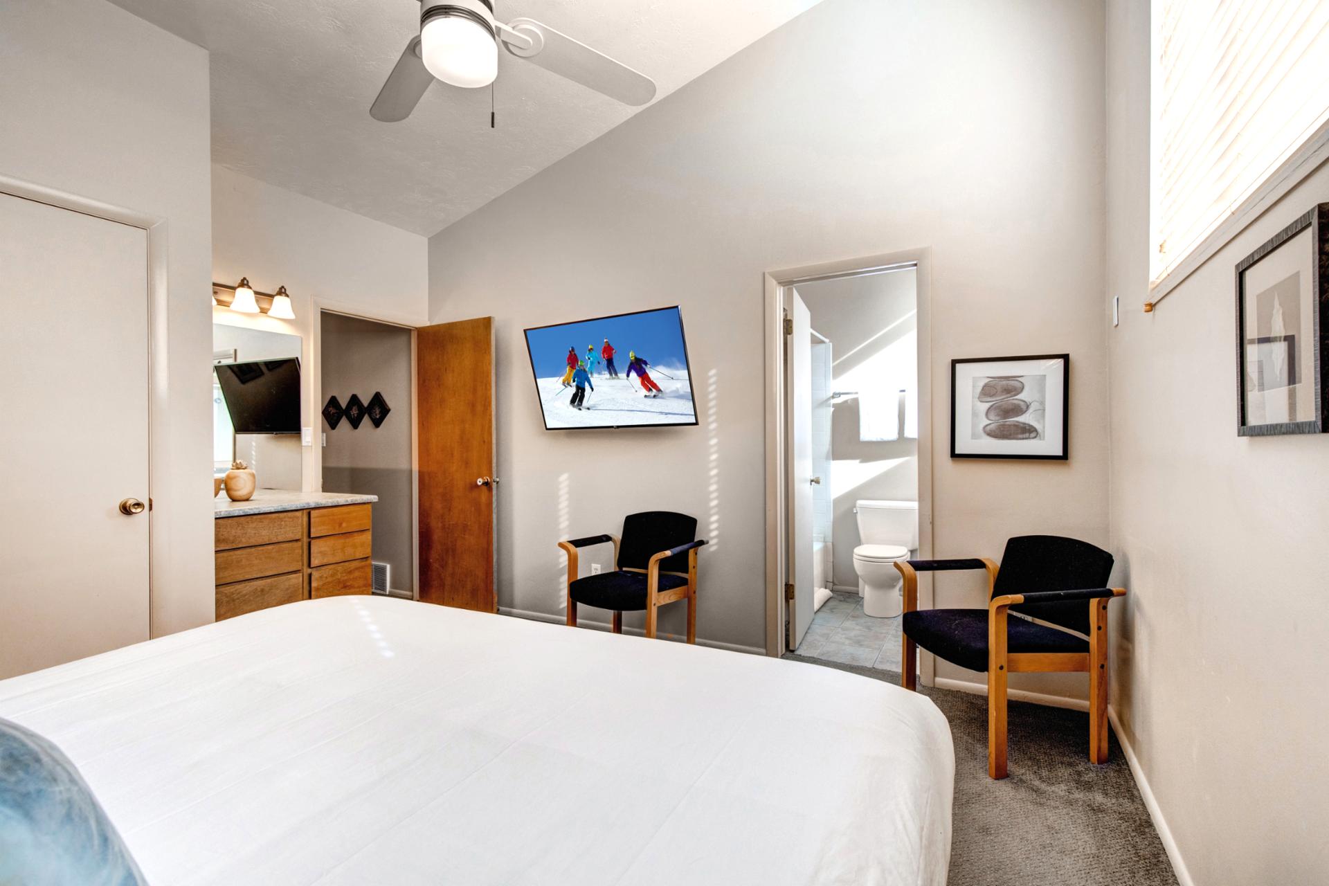Bedroom 1 features a King bed, smart TV, and ensuite bath for privacy and convenience.