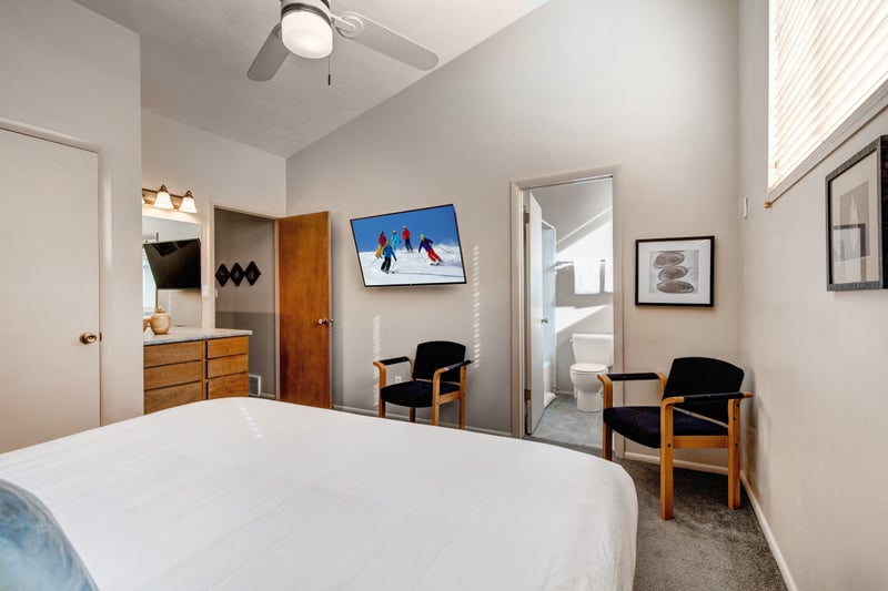 Bedroom 1 features a King bed, smart TV, and ensuite bath for privacy and convenience.
