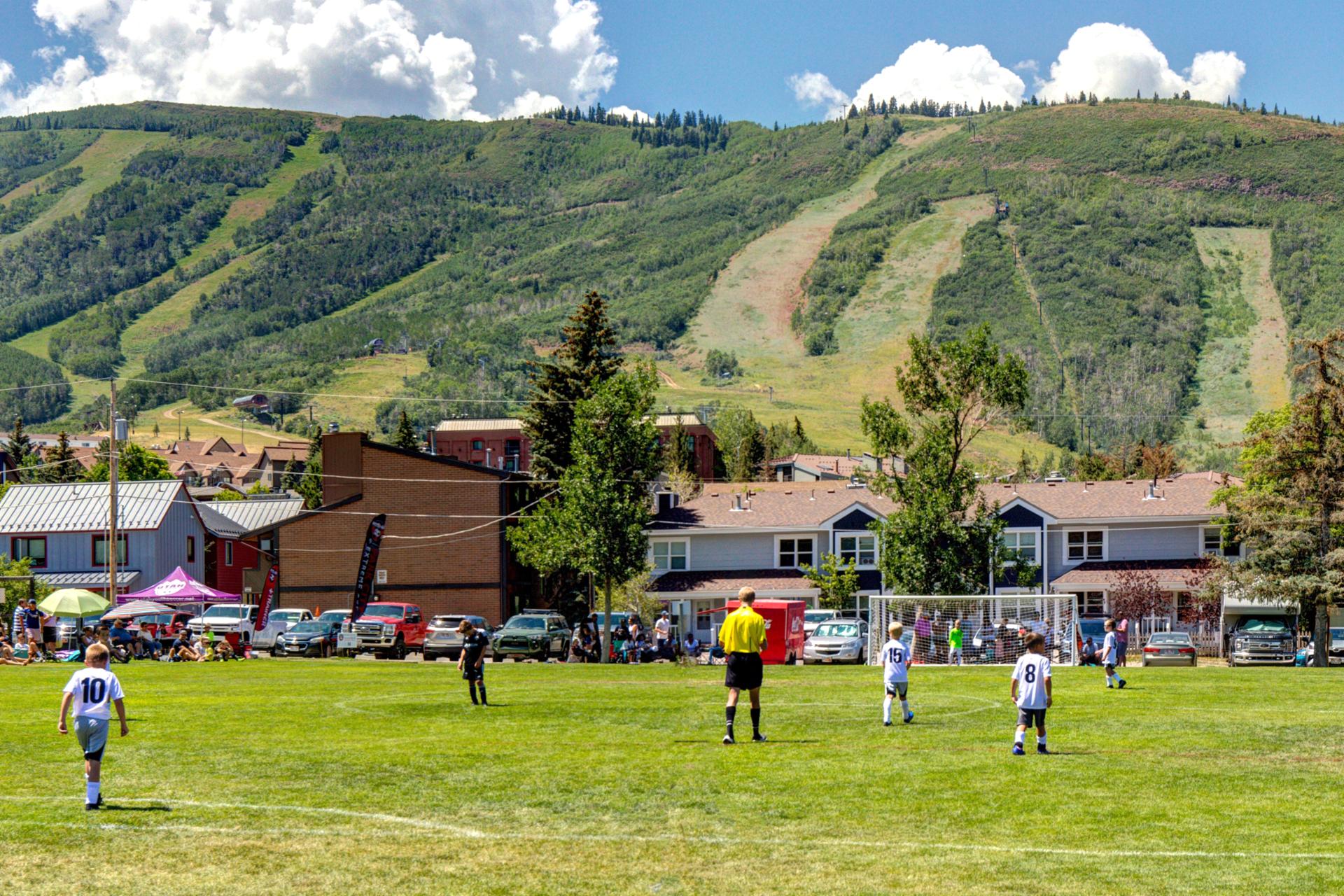 Local parks and recreational fields nearby offer space to play and explore.