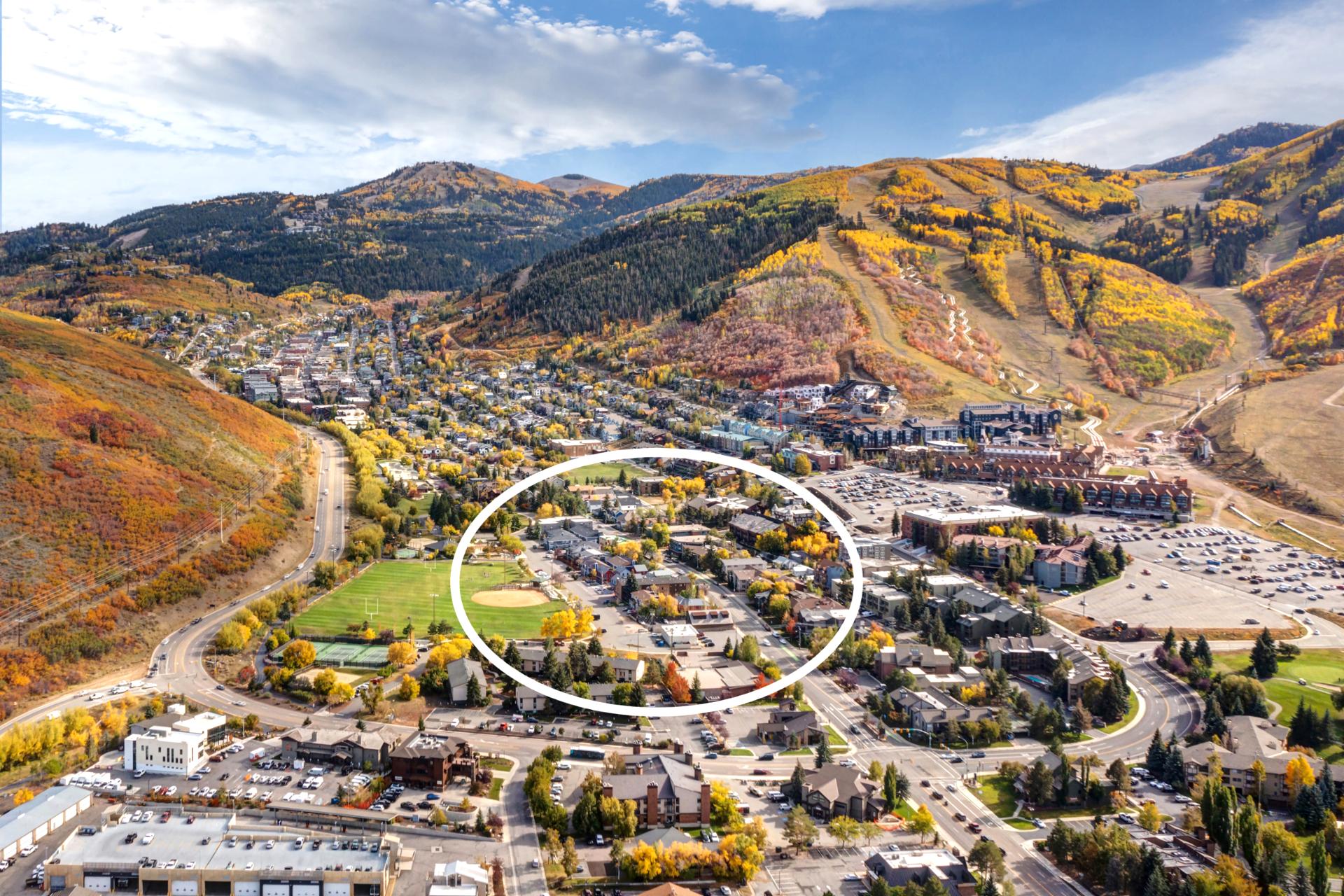 Aerial layout shows proximity to trails, lifts, and local amenities.