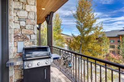 Grill out on your covered balcony and savor fresh mountain air with a view. VIN-14