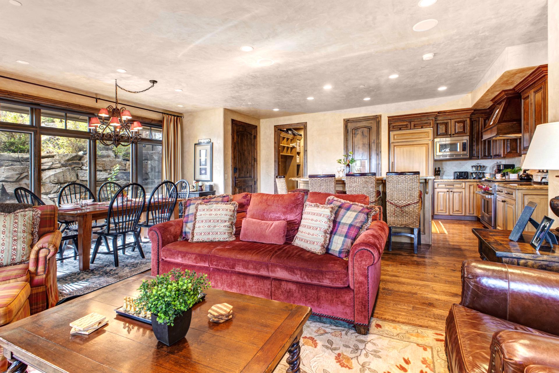 Natural light fills this open-concept living space, ideal for gathering and relaxing after the mountain.