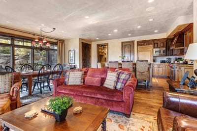 Natural light fills this open-concept living space, ideal for gathering and relaxing after the mountain. VIN-14