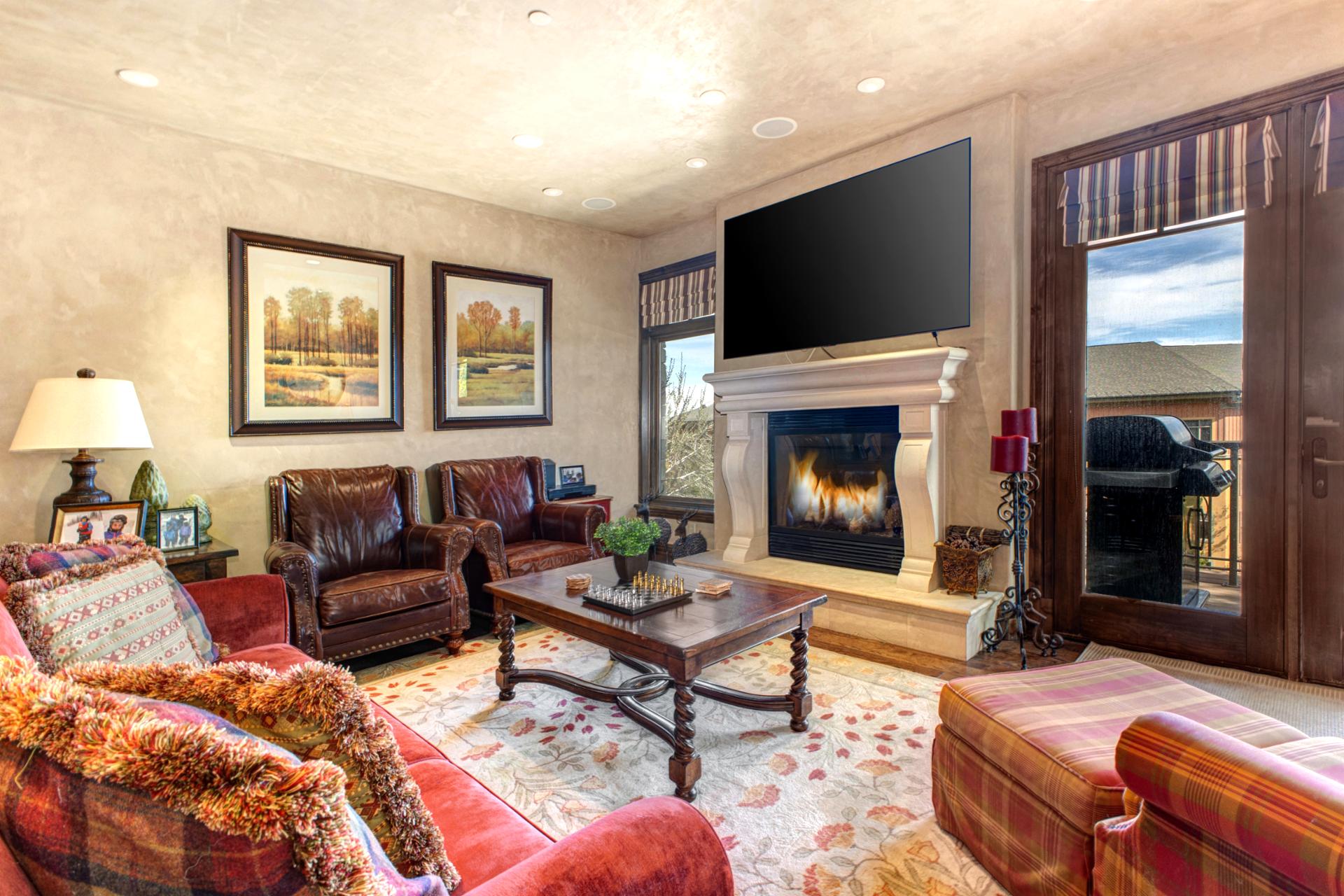Classic lodge design and cozy textures make the living area perfect for fireside lounging.