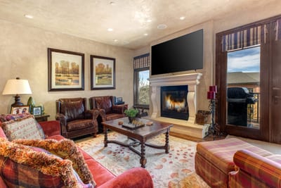 Classic lodge design and cozy textures make the living area perfect for fireside lounging. VIN-14