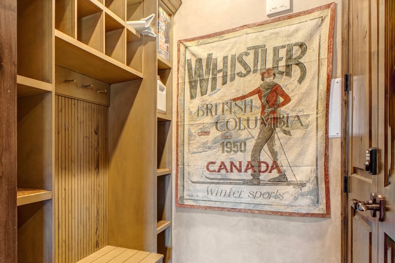 Drop boots, skis, and coats in the private mudroom with built-in storage and hooks.