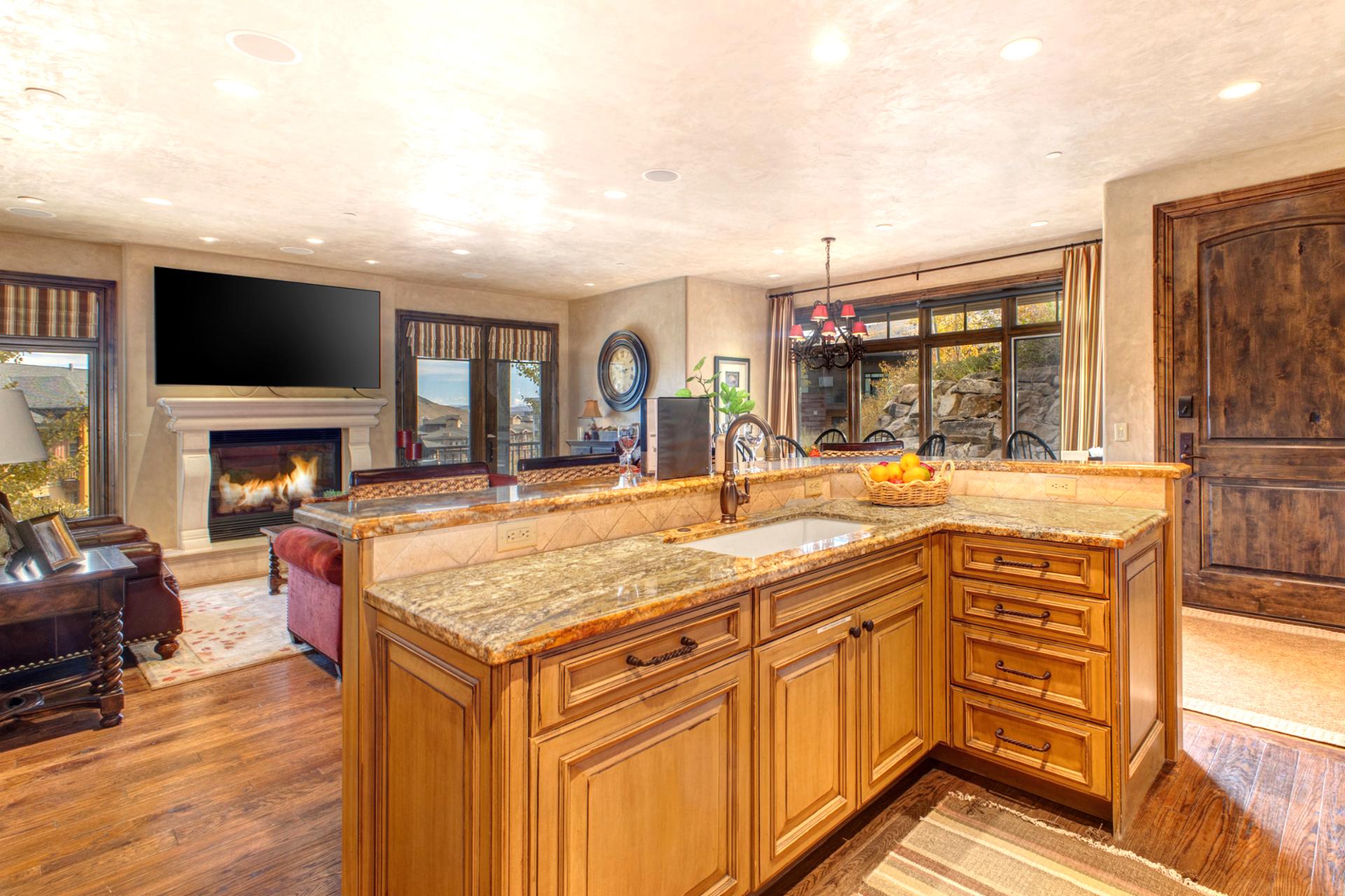 Wraparound counters and wood cabinetry give this kitchen both warmth and functionality.