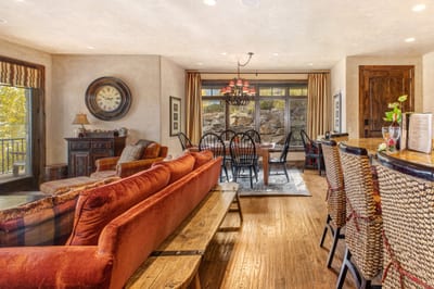 Floor-to-ceiling windows bring the outdoors in, with room to unwind and reconnect. VIN-14