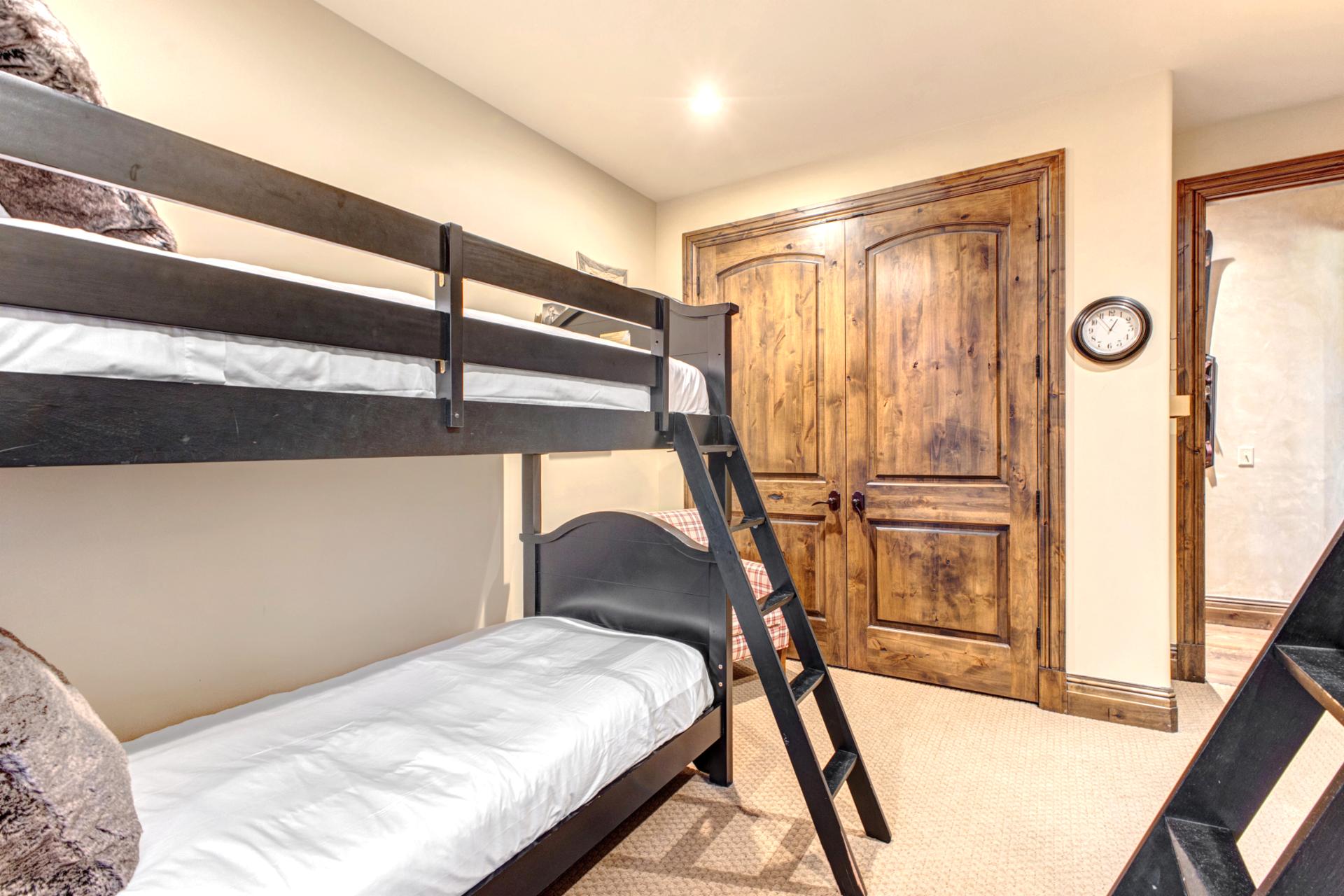 The guest room includes two twin-over-twin bunk sets. Perfect for kids or a friend's getaway.