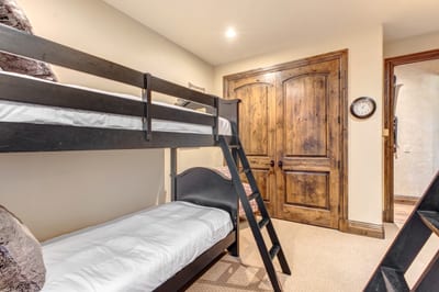 The guest room includes two twin-over-twin bunk sets. Perfect for kids or a friend's getaway. VIN-14