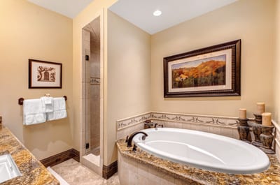 Soak in the deep jetted tub after a long day outdoors. Complete with mountain-style charm. VIN-14