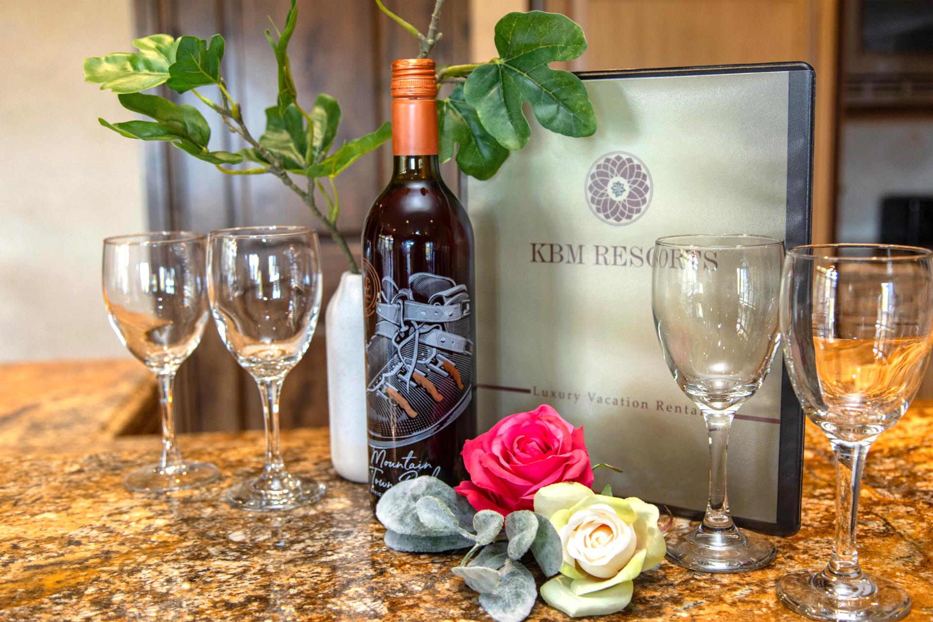 Details like fresh flowers and wine glasses elevate your stay with subtle, personal touches.