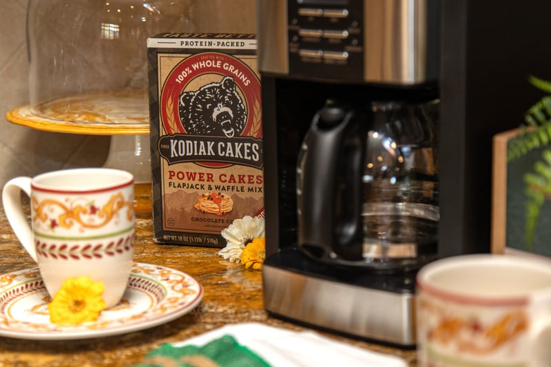 Brew a fresh pot before the first run; your kitchen coffee setup is ready for early mornings.