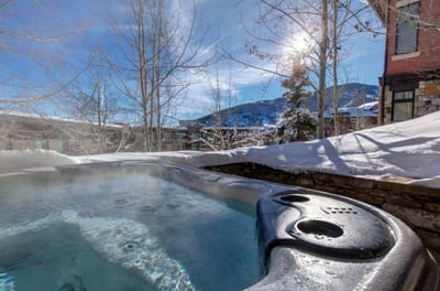 Relax in your private hot tub with forest views and peaceful surroundings.