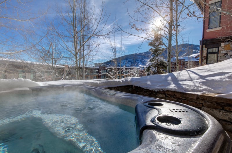 Relax in your private hot tub with forest views and peaceful surroundings.