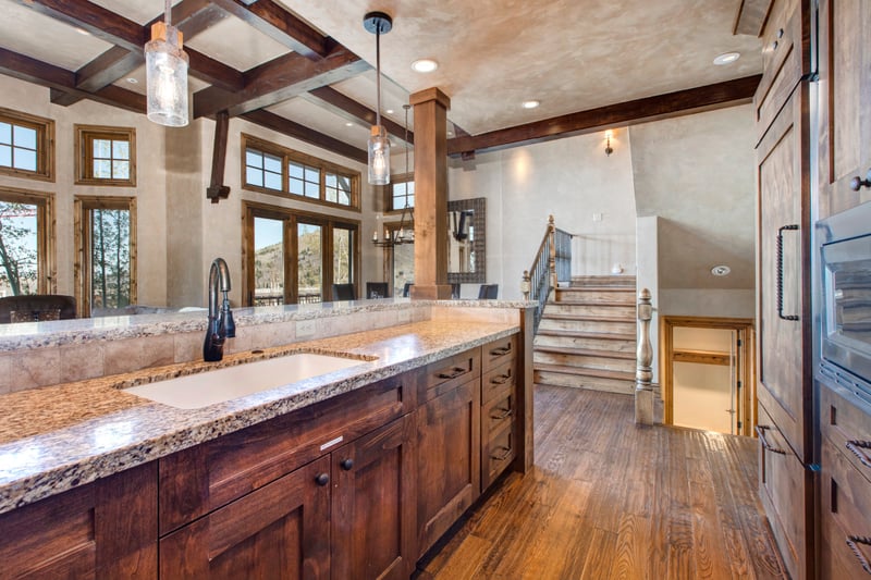Prep and entertain with ease in this fully equipped kitchen with bar seating and open flow.