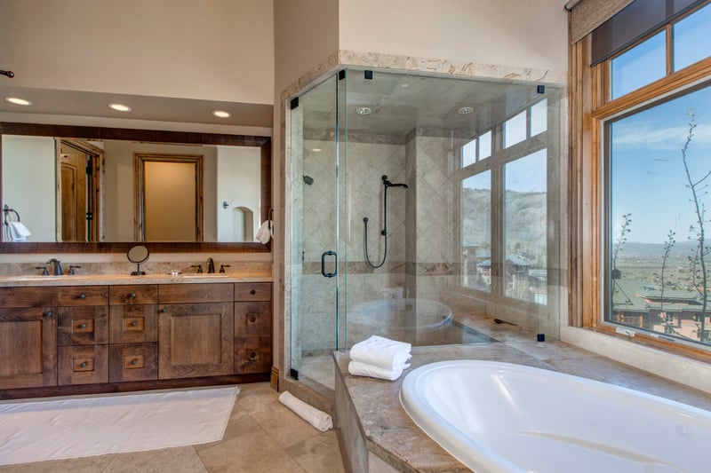 Master bath includes a soaking tub with a view, dual vanity, and walk-in shower.