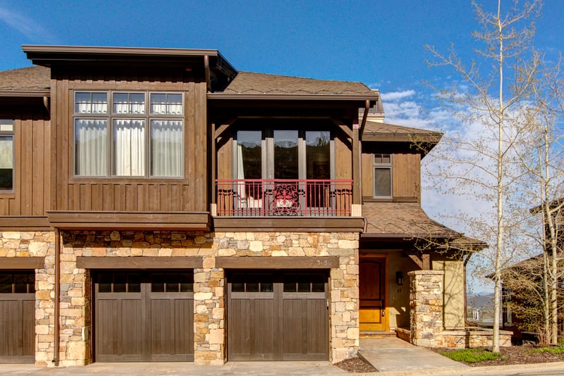Private driveway with attached two-car garage provides secure parking and gear storage, making arrivals simple and stress-free.